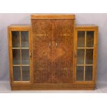 ART DECO SIDE BY SIDE BURR WALNUT CABINET having twin central doors with interior shelving flanked