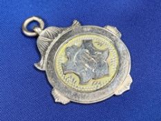 9CT GOLD FOB INSCRIBED 'Garreglwyd Tennis Club 1923 Llangefni' 6grms, 3 x 2.75cms