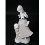 LLADRO - young standing girl with two doves, 24cms H