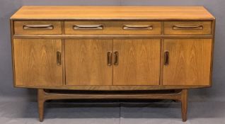G PLAN STYLE MID-CENTURY TEAK SIDEBOARD with three drawers over four cupboard doors on a shaped