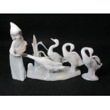 LLADRO - a group of three geese on an oval rusted base in various modes, a single standing