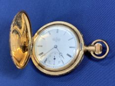 ELGIN GOLD FILLED FULL HUNTER POCKET WATCH, fully foliate engraved case with vacant cartouche to the