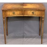 REPRODUCTION MAHOGANY REGENCY STYLE TWO DRAWER SIDE TABLE - crossbanded top with concave front on
