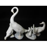 NAO - two Nao geese, a group of three on an oval base and a large single preening goose, 24cms H