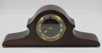 ANTIQUE WALNUT MANTEL CLOCK with Roman numeral dial and brass bezel, 17cms H, 42cms W, 8cms D