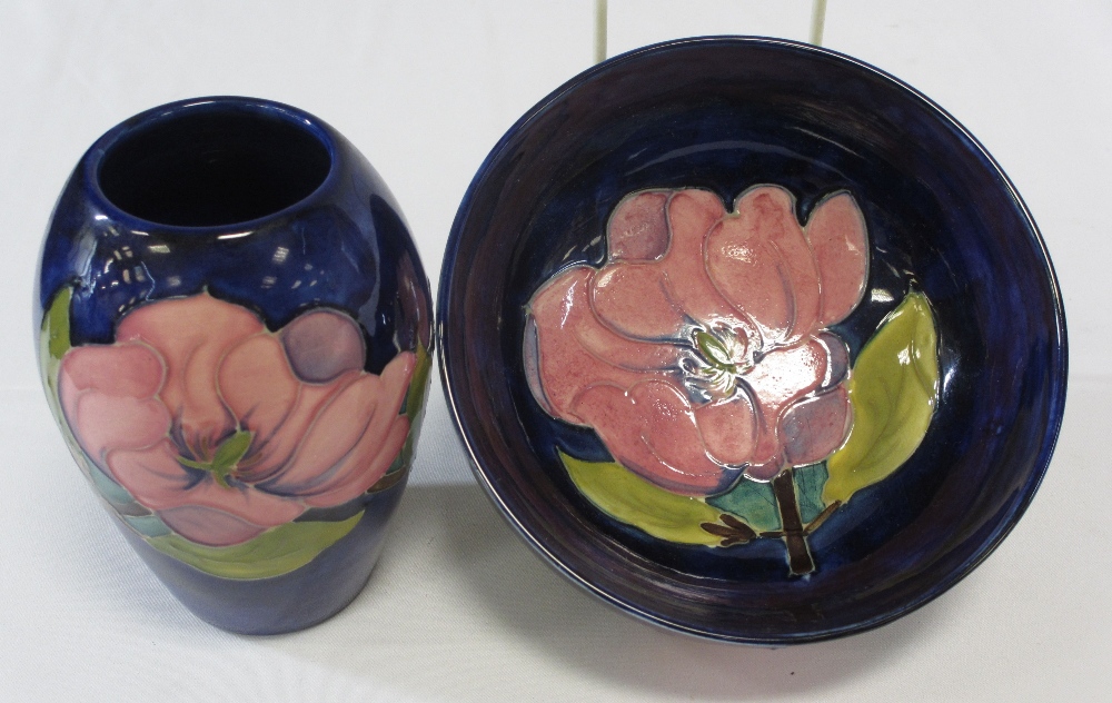 MOORCROFT MAGNOLIA GLOBULAR VASE & A BOWL - Cobalt Blue ground, 13cms H, 7cms H, 16cms diameter,