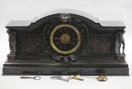 SLATE CLOCK - adorned with figural bronzes and panels, lion head cartouche surrounding the dial,