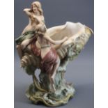 ROYAL DUX - stamped 1066, an Art Nouveau centrepiece, maidens seated upon a conch shell, 37cms tall,