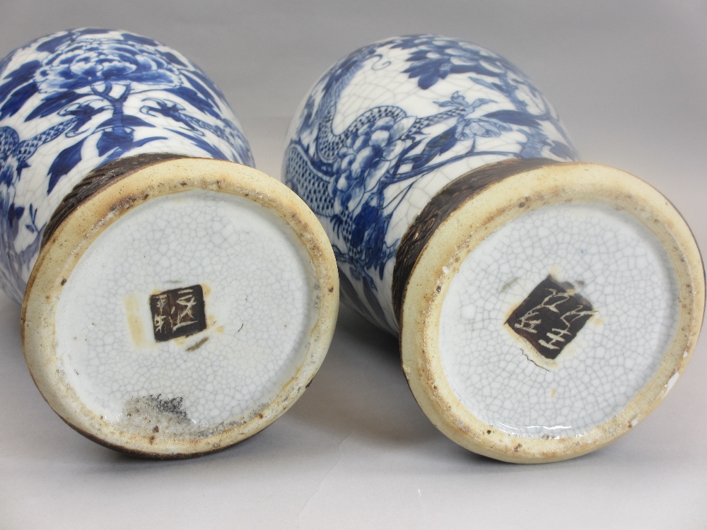 LARGE CRACKLE GLAZED BLUE & WHITE DRAGON VASES, A PAIR with covers having dog of Fo knops (missing - Image 2 of 2