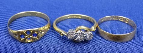 18CT GOLD VINTAGE RINGS (3) - including a crossover example with three diamonds in an illusion