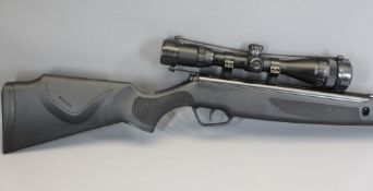 STOEGER BLACK 0.22 CALIBRE AIR RIFLE with Stoeger 3-9x40 AO scope, as new condition with hatched