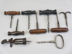 CORKSCREWS - a large collection including a pair with cigar shaped handles, mainly 19th century