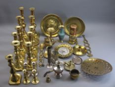 VINTAGE & LATER BRASSWARE - a good quantity of candlesticks, repousse plaques and a reproduction