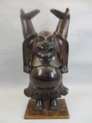 LARGE WOODEN CARVED STANDING BUDDHA - hands aloft, 55cms overall H, on a rectangular platform