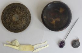 A CIRCULAR ORIENTAL TORTOISE SHELL BOX - with figures to the lid and pagoda decoration to the rim