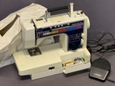 TOYOTA ELECTRIC SEWING MACHINE with foot pedal and plastic cover, E/T