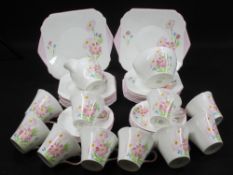 SHELLEY BONE CHINA PART TEA SERVICE - 34 pieces, hand painted floral with pink highlighting