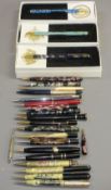 PROPELLING PENCILS - an assortment to include: Modern Buckingham Palace Garden shop enamelled, in