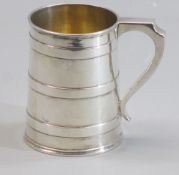 SILVER TANKARD - slightly tapered, the body having three wide bands and with shaped handle, London