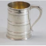 SILVER TANKARD - slightly tapered, the body having three wide bands and with shaped handle, London