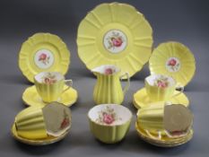 OLD ROYAL BONE CHINA PART TEA SERVICE - in yellow and gilt with interior rose decoration, 20 pieces