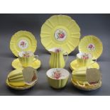 OLD ROYAL BONE CHINA PART TEA SERVICE - in yellow and gilt with interior rose decoration, 20 pieces