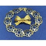 9CT GOLD LINK BRACELET, 4.4grms, and a 9ct gold bow pin brooch with bright cut decoration, 2.