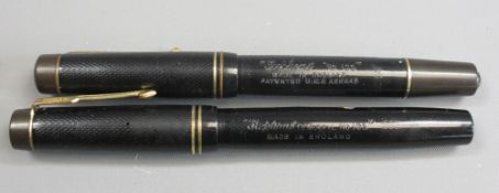 FOUNTAIN PENS (2) - A late 1930s black chased hard rubber Stephens Leverfil No.106 with gold