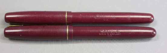 WATERMANS W2 FOUNTAIN PENS (2) -late 1940s, Burgundy with gold plated trim and original Waterman W-