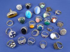 APPROXIMATELY 29 SILVER & WHITE METAL DRESS RINGS - a large parcel, 54ozs