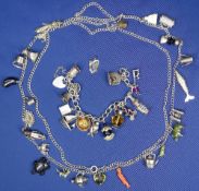 SILVER CHARM JEWELLERY - to include a 72cms L 800 stamped necklace holding 25 charms including