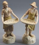 ROYAL DUX (2) - stamped 2456 and 2457 - young couple each with basket, 27cms tall