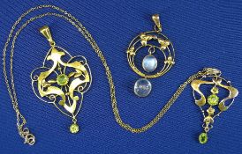 9CT GOLD SCROLLED PENDANTS (3) - two with peridots and one with moonstones, 8.2grms