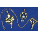 9CT GOLD SCROLLED PENDANTS (3) - two with peridots and one with moonstones, 8.2grms