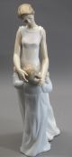 LLADRO - model 677, 'Someone to look up to' - a mother embracing daughter, 36cms tall