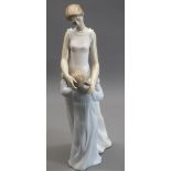 LLADRO - model 677, 'Someone to look up to' - a mother embracing daughter, 36cms tall