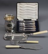 A BOXED SET OF 6 EP CAKE FORKS, a plain EP tankard by Barker Ellis with scrolled handle, a pair of
