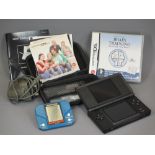 NINTENDO DS LITE with charger, carry case and instruction booklets and a Grandstand King Kong Jungle