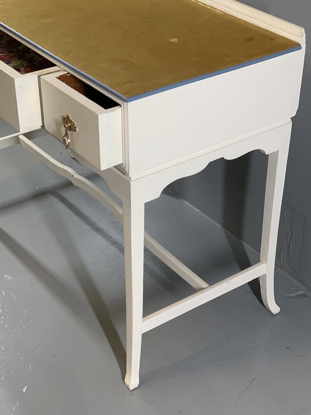 WHITE PAINTED THREE DRAWER DRESSING TABLE with shaped apron and stretcher, 80cms H, 107cms W, - Image 3 of 5