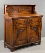 EDWARDIAN OAK SHELF BACK SIDEBOARD, the two panel back with carved leaf detail over a base section