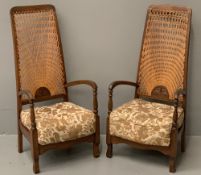 OAK & CANED HIGH BACK ARMCHAIRS, a pair, the canework in fan detail above a carved lower rail with