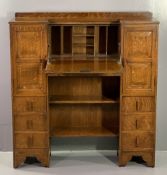 VINTAGE OAK BUREAU BOOKCASE with panelled side cupboards and lower drawers flanking a drop down fall