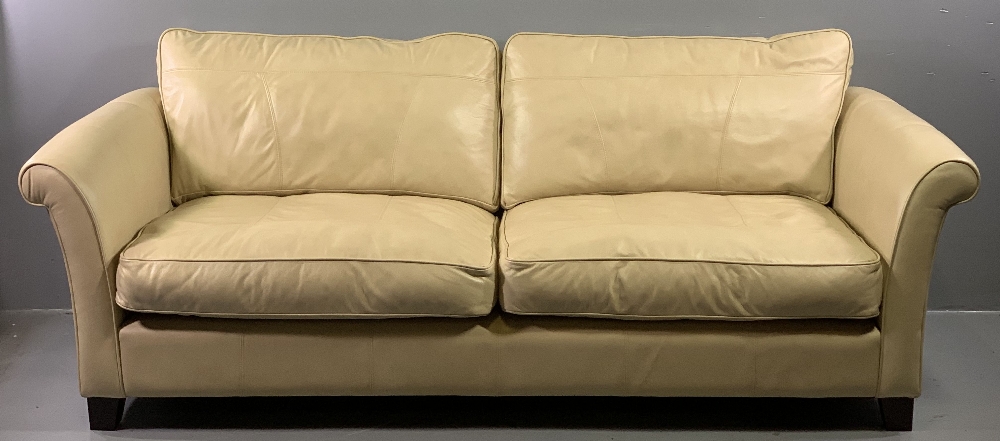MODERN CREAM LEATHER SETTEE having large double cushions, 85cms H, 226cms W, 93cms D