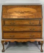 VINTAGE MAHOGANY FALL FRONT BUREAU with beaded oval panel to the fall and moulded edging, Greek