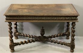 JACOBEAN STYLE OAK LIBRARY TABLE with carved edge and frieze detail, on barley twist supports with