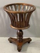 REPRODUCTION MAHOGANY PLANTER STAND on a carved bulbous column and trefoil base on bun feet, 67cms