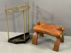 VINTAGE BRASS STICKSTAND, 62cms H, 41cms W, 20cms D and a leather seated camel stool, 36cms H, 49cms