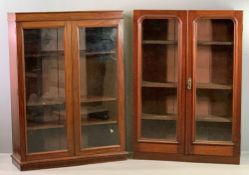 VICTORIAN MAHOGANY TWIN DOOR BOOKCASE TOPS (2) - both having interior adjustable shelves on plinth