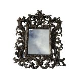 Heavily carved oak, Florentine style wall mirror