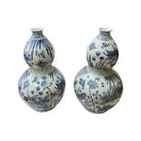 A pair of Chinese blue and white double Gourd porcelain vases